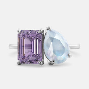 Toi et Moi ring with an emerald-cut Amethyst and a pear-cut Moonstone.