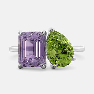Toi et Moi ring with an emerald-cut Amethyst and a pear-cut Green Peridot.