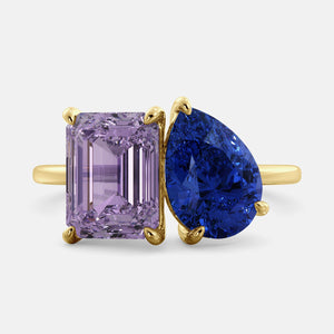 Toi et Moi ring with an emerald-cut Amethyst and a pear-cut Blue Sapphire.