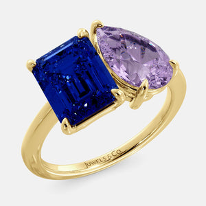 Toi et Moi ring with an emerald-cut Blue Sapphire and a pear-cut Amethyst.
