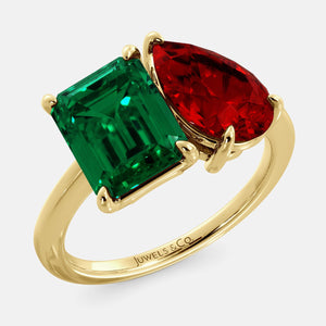 Toi et Moi ring with an emerald-cut Emerald and a pear-cut Ruby.