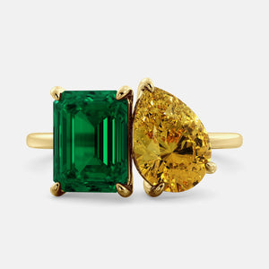Toi et Moi ring with an emerald-cut Emerald and a pear-cut Citrine.
