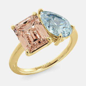 Toi et Moi ring with an emerald-cut Morganite and a pear-cut Aquamarine.