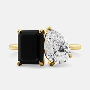 Toi et Moi ring with an emerald-cut Onyx and a pear-cut White Topaz.
