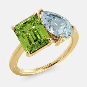 Toi et Moi ring with an emerald-cut Green Peridot and a pear-cut Aquamarine.