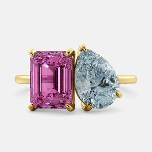 Toi et Moi ring with an emerald-cut Pink Sapphire and a pear-cut Aquamarine.