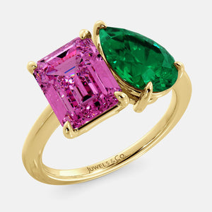 Toi et Moi ring with an emerald-cut Pink Sapphire and a pear-cut Emerald.
