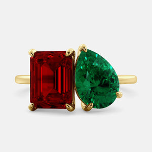 Toi et Moi ring with an emerald-cut Ruby and a pear-cut Emerald.