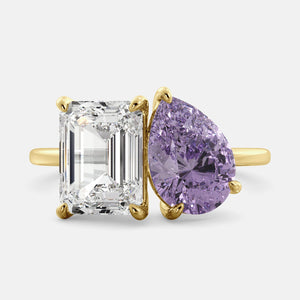 Toi et Moi ring with an emerald-cut Diamond and a pear-cut Amethyst.
