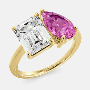 Toi et Moi ring with an emerald-cut Diamond and a pear-cut Pink Sapphire.