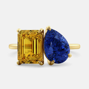 Toi et Moi ring with an emerald-cut Citrine and a pear-cut Blue Sapphire.