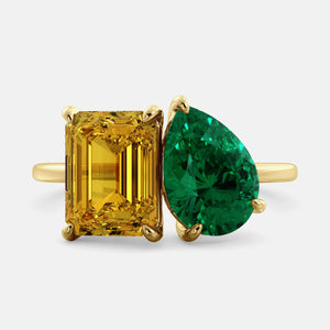 Toi et Moi ring with an emerald-cut Citrine and a pear-cut Emerald.