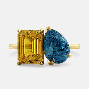 Toi et Moi ring with an emerald-cut Citrine and a pear-cut London Blue Topaz.