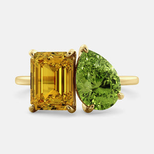 Toi et Moi ring with an emerald-cut Citrine and a pear-cut Green Peridot.