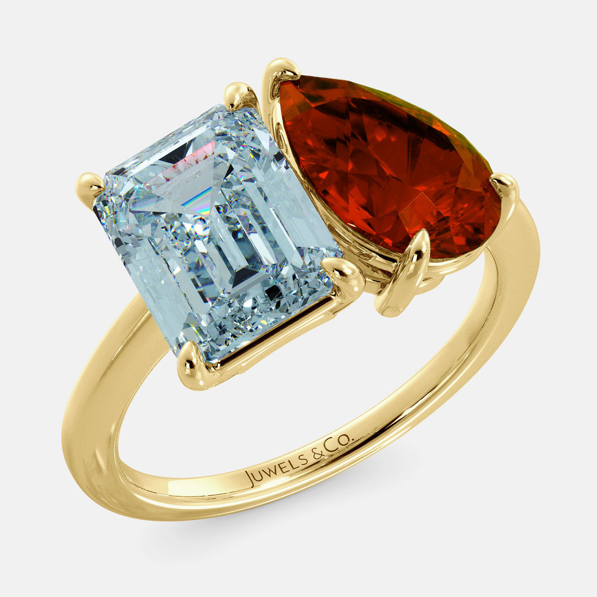 A toi et moi ring with an emerald-cut aquamarine and a pear-cut gemstone. The emerald-cut morganite is set on the left of the ring, and the pear-cut gemstone is set on the right. The ring is made of recycled yellow gold and has a simple, elegant design. The pear-cut gemstone can be customized. **Here are some additional details about the image:** * The emerald-cut aquamarine is a birthstone for March. * The pear-cut gemstone can be customized to any stone of your choice.