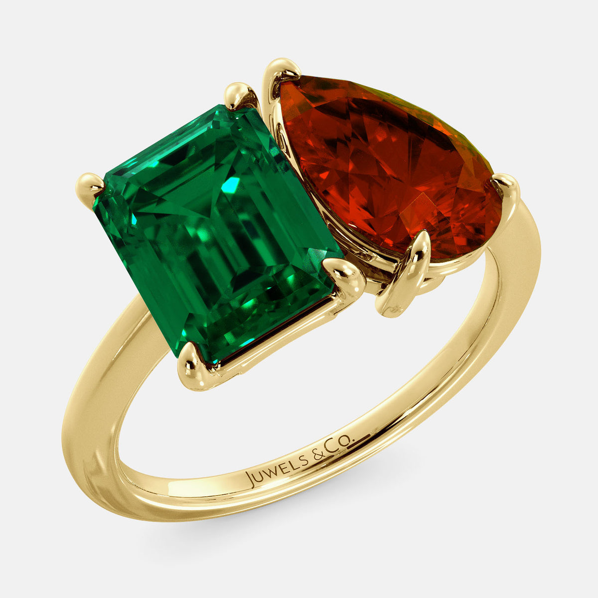 emerald and a pear-cut gemstone. The emerald-cut morganite is set on the left of the ring, and the pear-cut gemstone is set on the right. The ring is made of recycled yellow gold and has a simple, elegant design. The pear-cut gemstone can be customized. **Here are some additional details about the image:** * The emerald-cut white emerald is a birthstone for May. * The pear-cut gemstone can be customized to any stone of your choice.