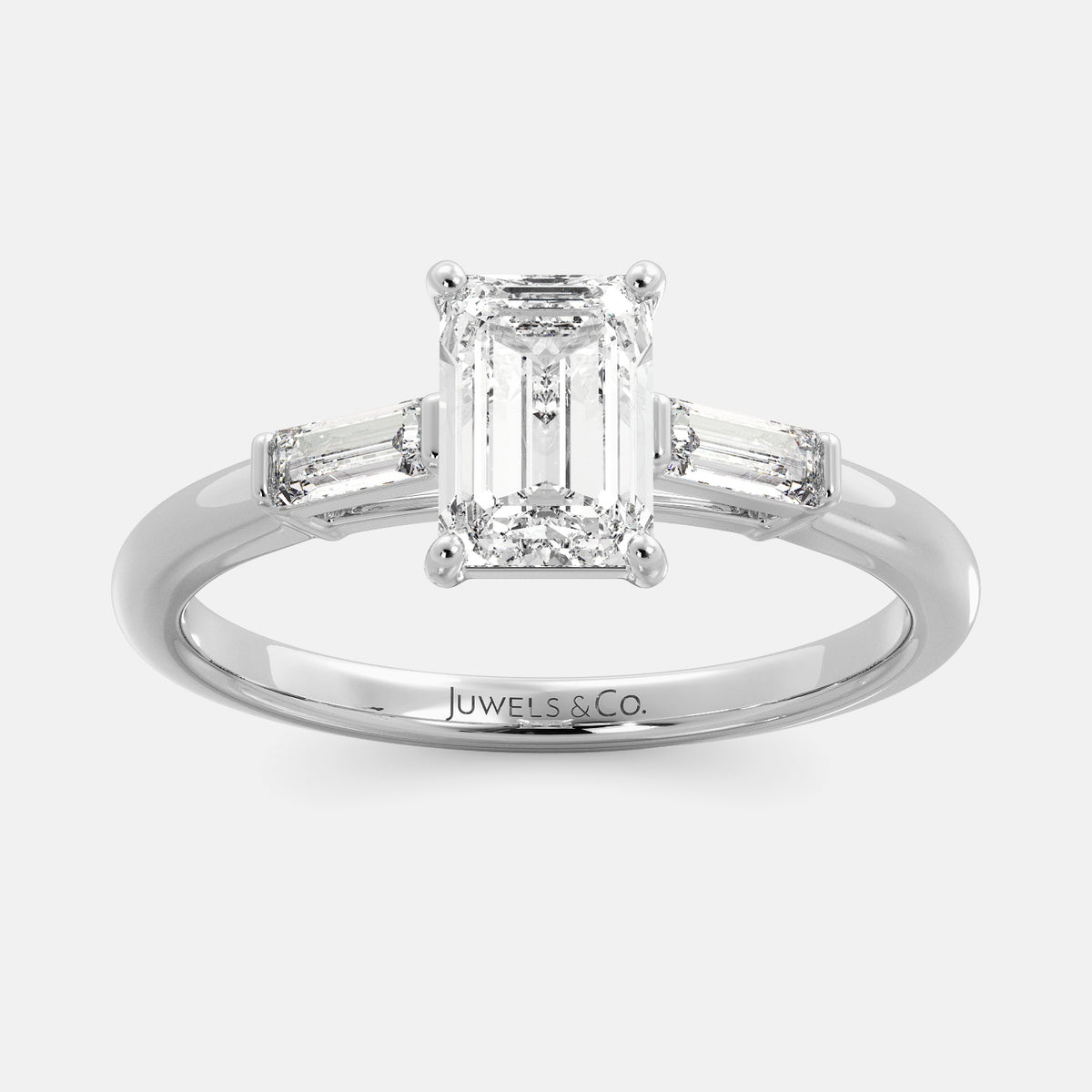 The Emerald Solitaire Diamond Ring with Baguettes