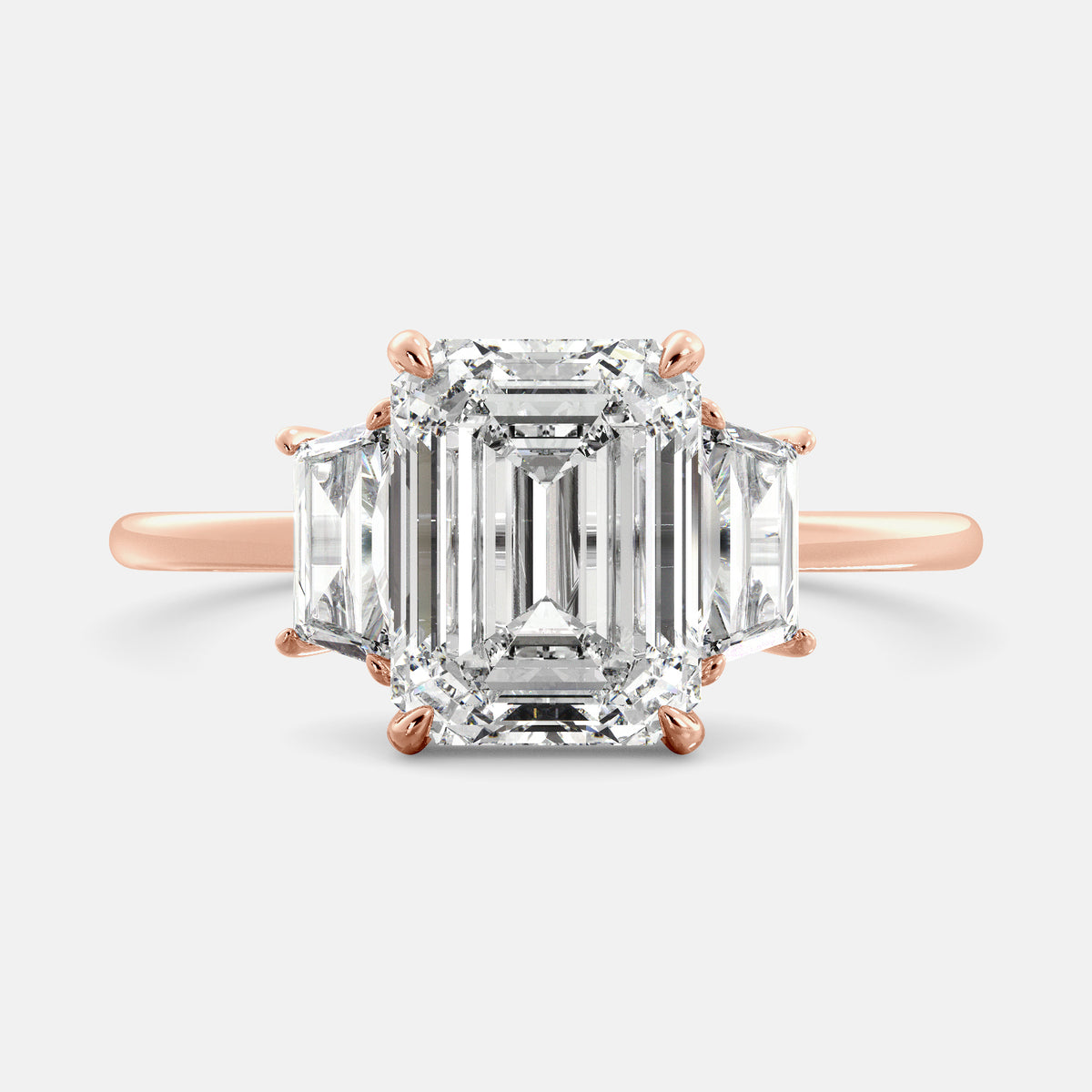 Embrace Opulence: The Julia Emerald Solitaire Diamond Ring with Tapered Baguettes