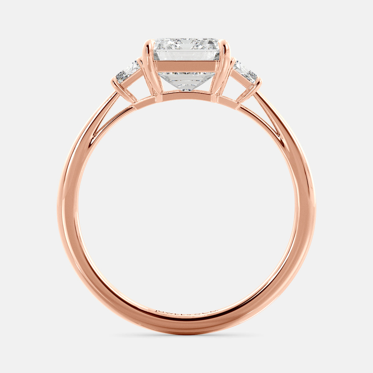 Embrace Opulence: The Julia Emerald Solitaire Diamond Ring with Tapered Baguettes