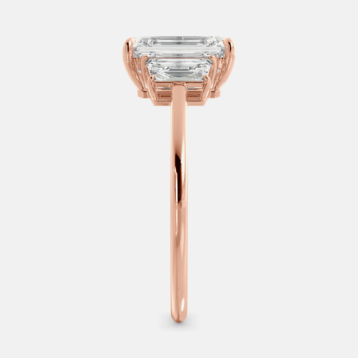Embrace Opulence: The Julia Emerald Solitaire Diamond Ring with Tapered Baguettes
