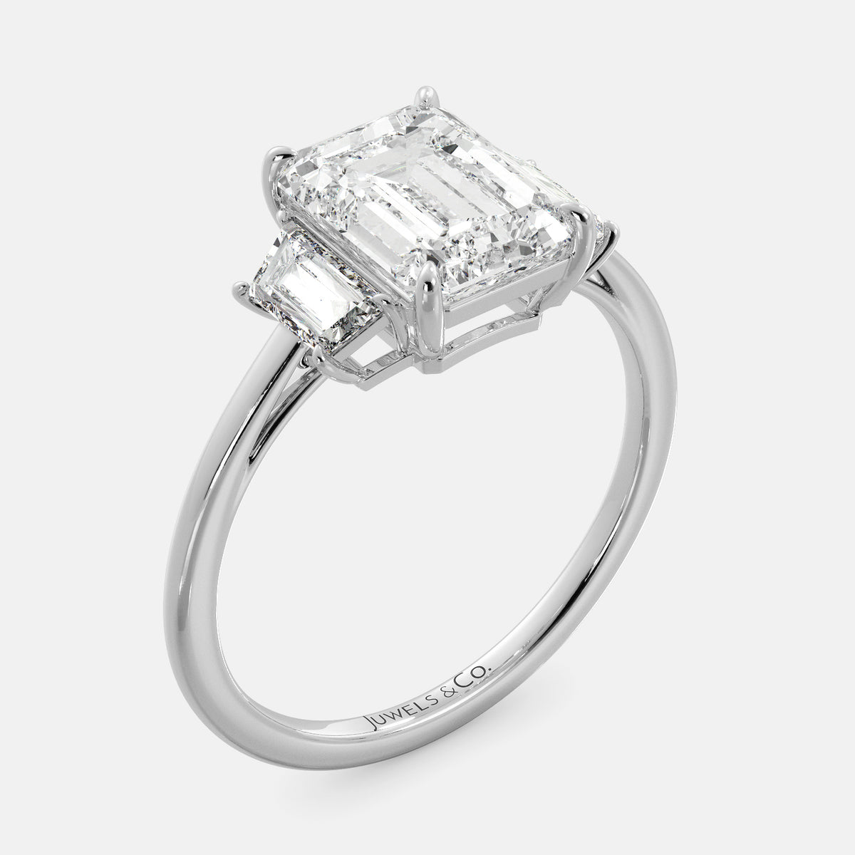 Embrace Opulence: The Julia Emerald Solitaire Diamond Ring with Tapered Baguettes