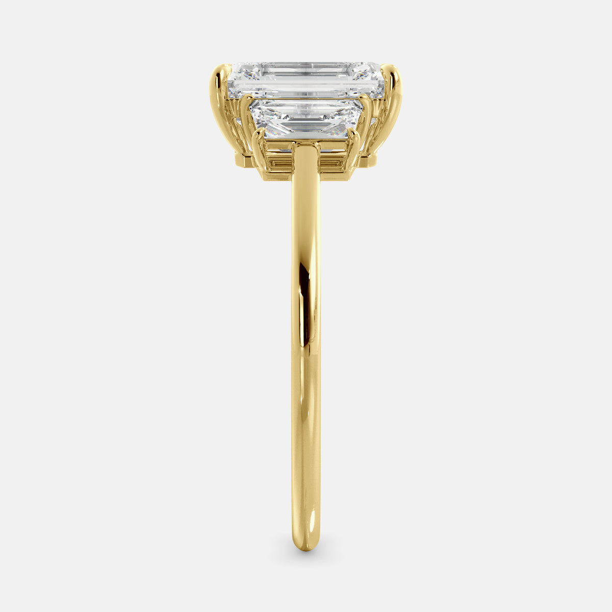 Embrace Opulence: The Julia Emerald Solitaire Diamond Ring with Tapered Baguettes