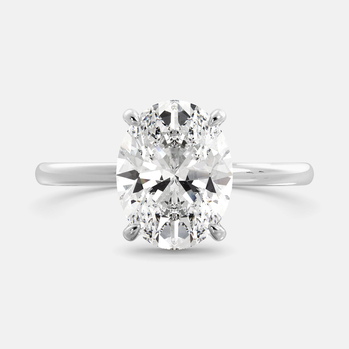 Unveiling Brilliance: The Oval Diamond Engagement Ring with Hidden Halo