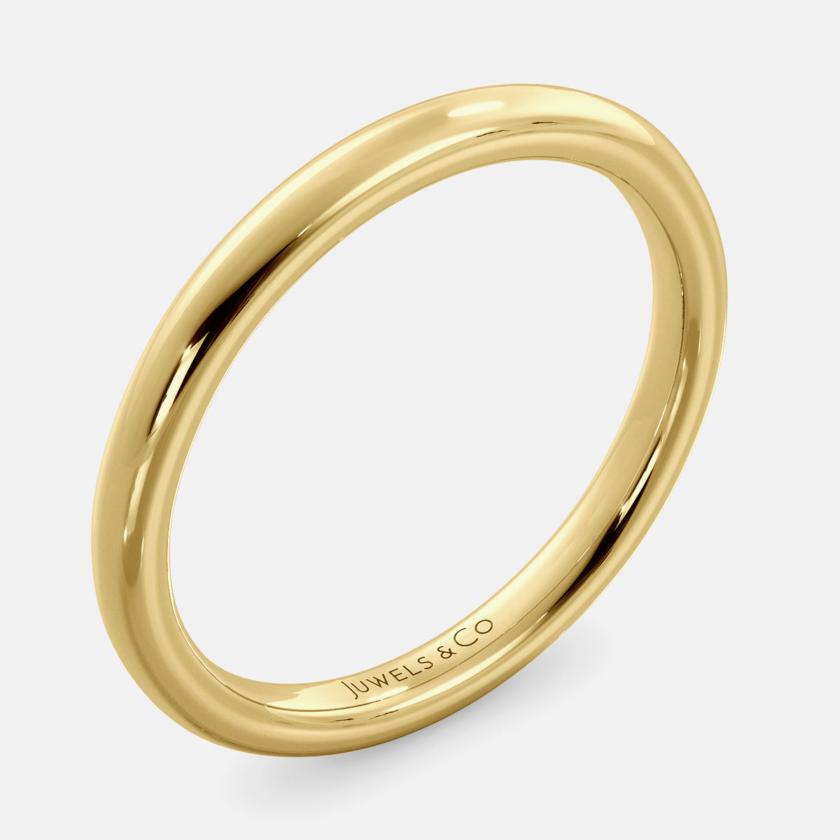 A close-up of a simple round wedding band in 14K yellow gold. The band is a classic and timeless design that is perfect for any occasion.