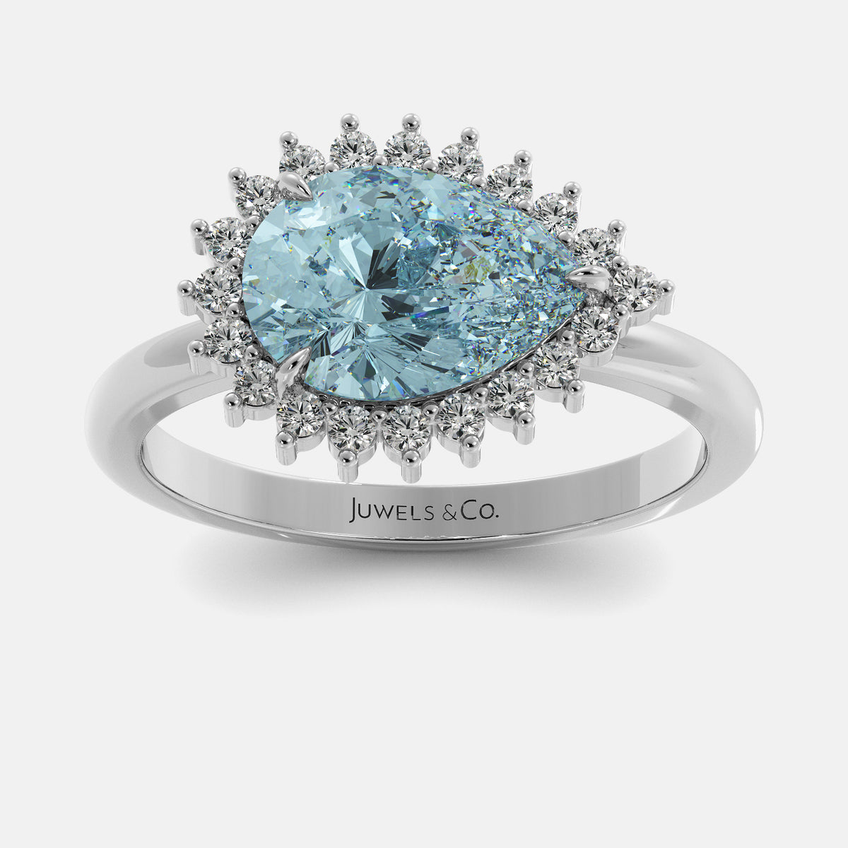 Silver ring with a large blue gemstone and smaller diamonds on a white background