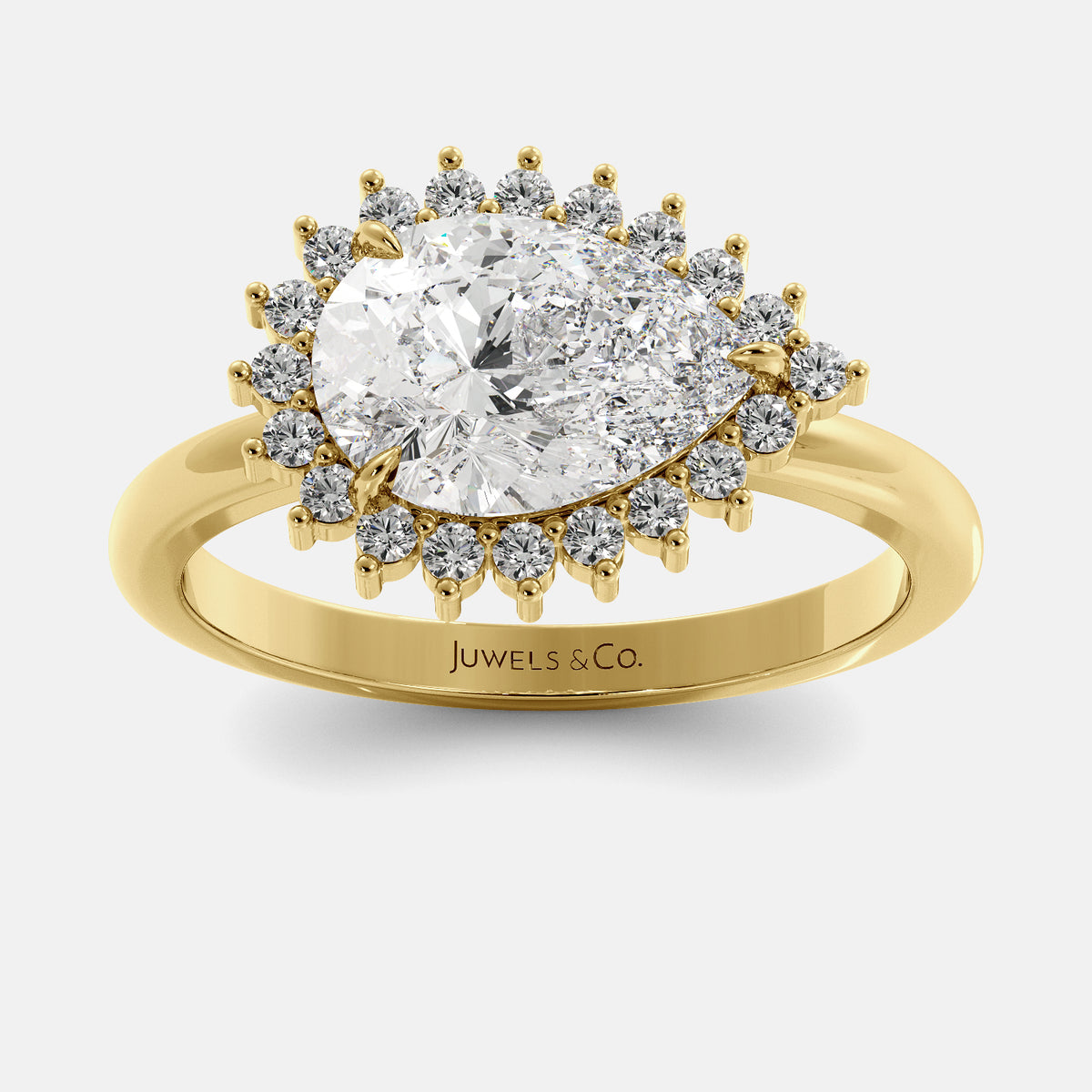 Gold ring with a large diamond and smaller diamonds on a white background, featuring the brand 'Juwels & Co'.