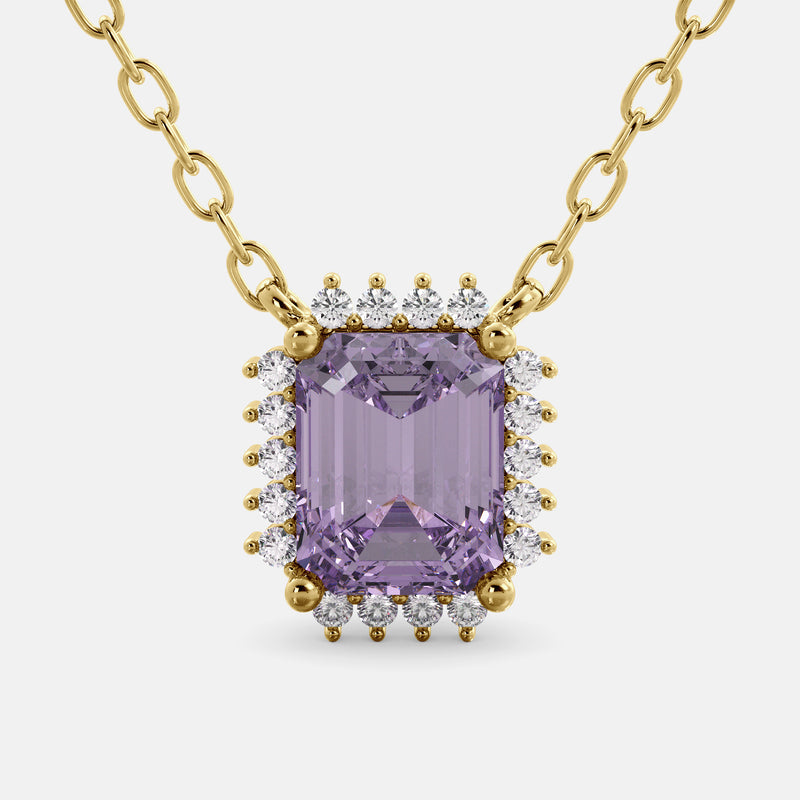 Purple gemstone necklace with gold chain on a white background