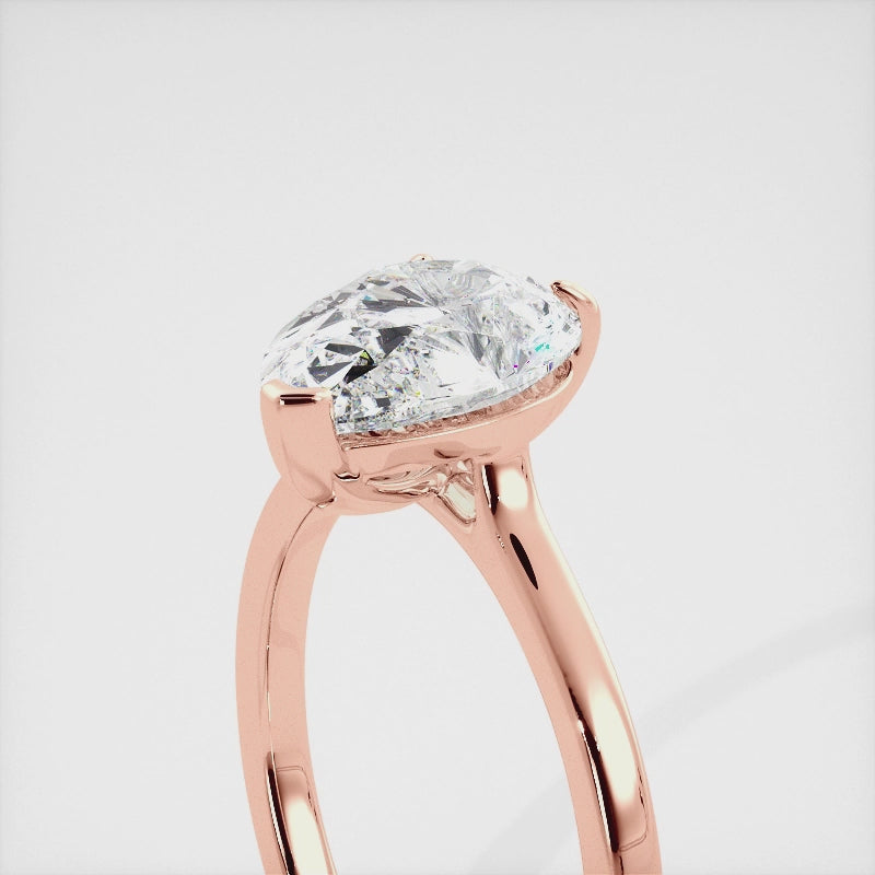 The Emilia Pear Diamond Ring: Where Elegance Meets Empowerment