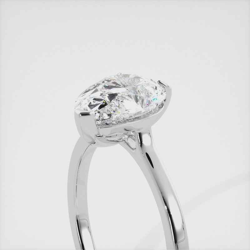 The Emilia Pear Diamond Ring: Where Elegance Meets Empowerment