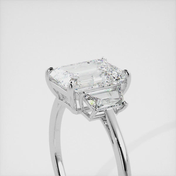 Embrace Opulence: The Julia Emerald Solitaire Diamond Ring with Tapered Baguettes