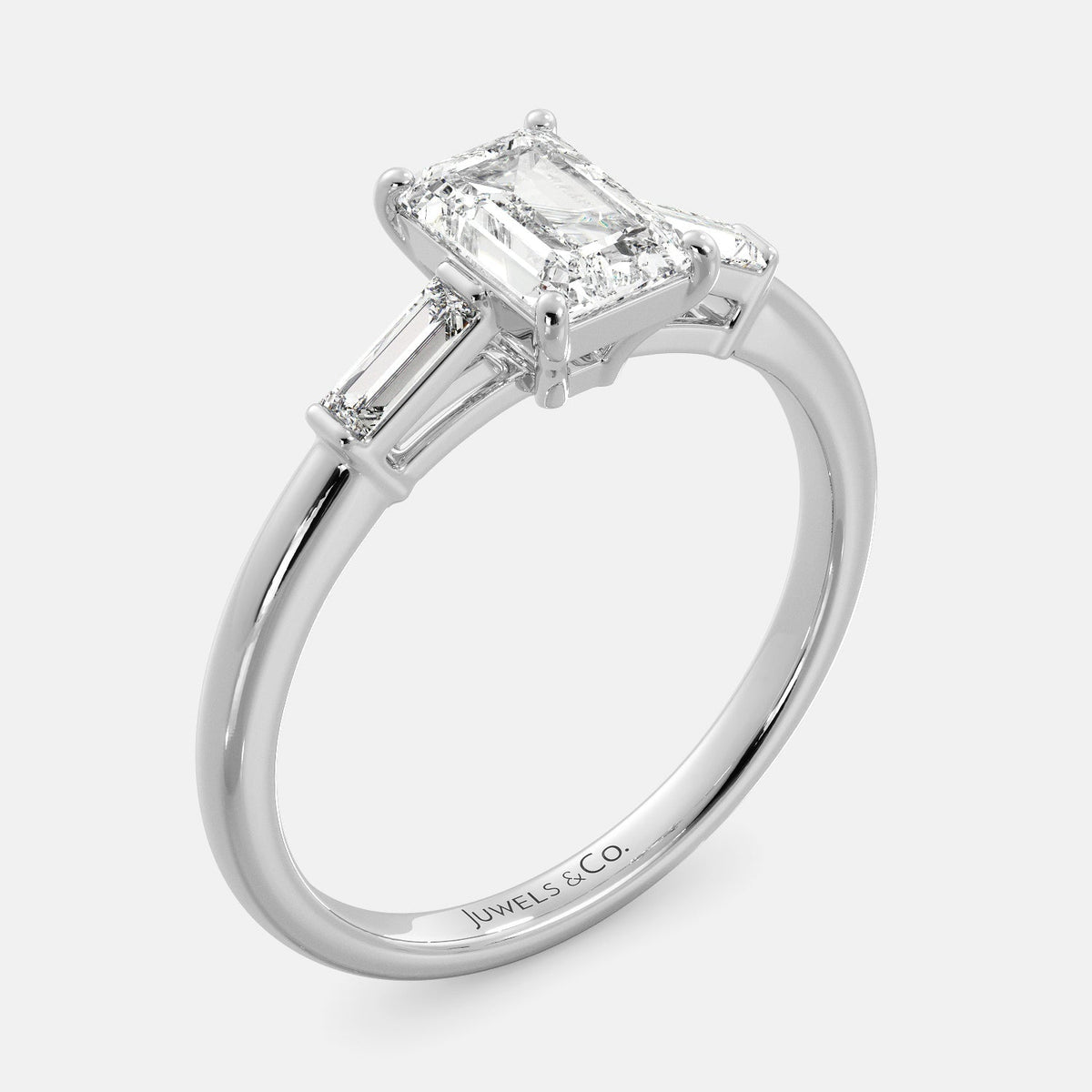 Juwels &amp; Co Emerald Solitaire Diamond Ring With Tapered Baguette Side Stones with white gold 14K Band 