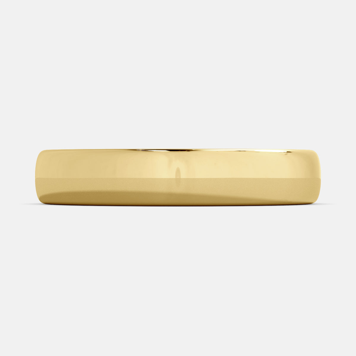A close-up of a yellow gold flat wedding band with a hidden stone. The band is a classic and timeless design that is perfect for any occasion. The hidden stone can be customized with one of 12 different gemstones, including diamonds, rubies, sapphires, and emeralds. This makes the band a unique and personal choice for the wearer.