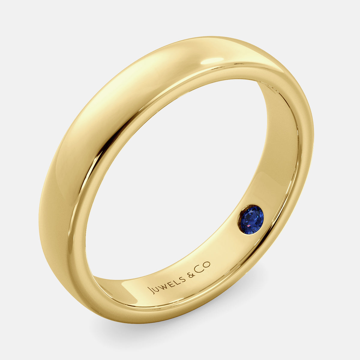 A close-up of a yellow gold flat wedding band with a hidden stone. The band is a classic and timeless design that is perfect for any occasion. The hidden stone can be customized with one of 12 different gemstones, including diamonds, rubies, sapphires, and emeralds. This makes the band a unique and personal choice for the wearer.