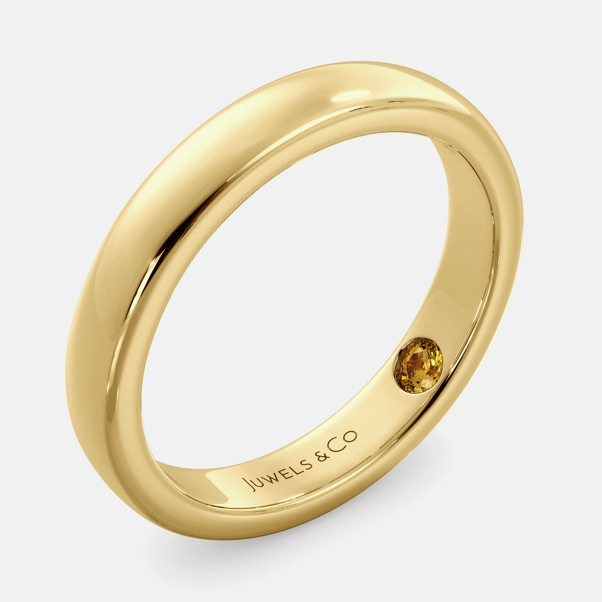 A close-up of a yellow gold flat wedding band with a hidden stone. The band is a classic and timeless design that is perfect for any occasion. The hidden stone can be customized with one of 12 different gemstones, including diamonds, rubies, sapphires, and emeralds. This makes the band a unique and personal choice for the wearer.