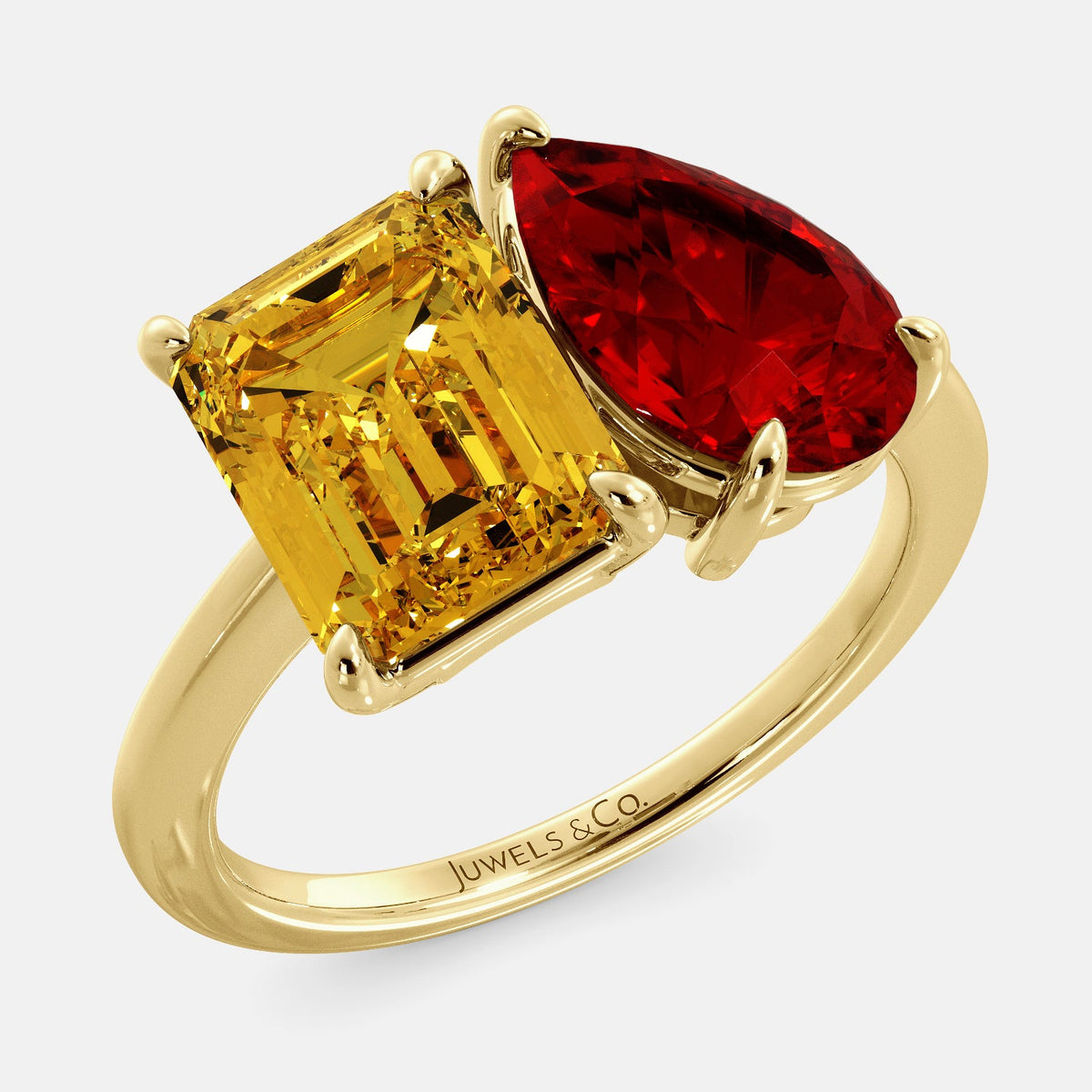 A toi et moi ring with an emerald-cut Citrin and pear-cut gemstone. The emerald-cut morganite is set on the left of the ring, and the pear-cut gemstone is set on the right. The ring is made of recycled yellow gold and has a simple, elegant design. The pear-cut gemstone can be customized. **Here are some additional details about the image:** * The emerald-cut white Citrin is a birthstone for November. * The pear-cut gemstone can be customized to any stone of your choice.